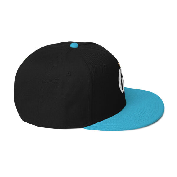 snapback-aqua-blue-black-black-right-side-68068fd228684.jpg Get Noticed with the Stylish GA Snapback Hat - Perfect for Any Occasion