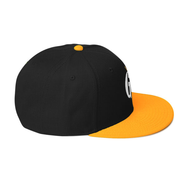 snapback-gold-black-black-right-side-68068fd229d16.jpg Get Noticed with the Stylish GA Snapback Hat - Perfect for Any Occasion